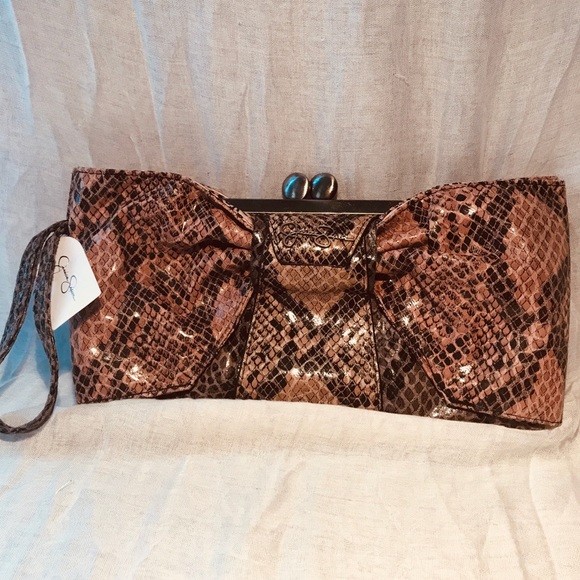 Jessica Simpson Handbags - JESSICA SIMPSON NWT FAUX SNAKESKIN WITH BOW CLUTCH
